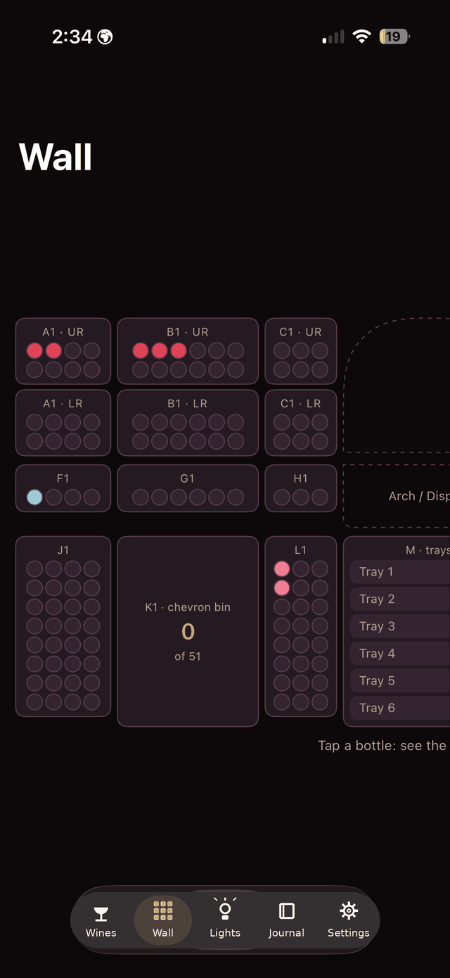 The Wall tab: a to-scale schematic of the rack with sections, bins, and trays